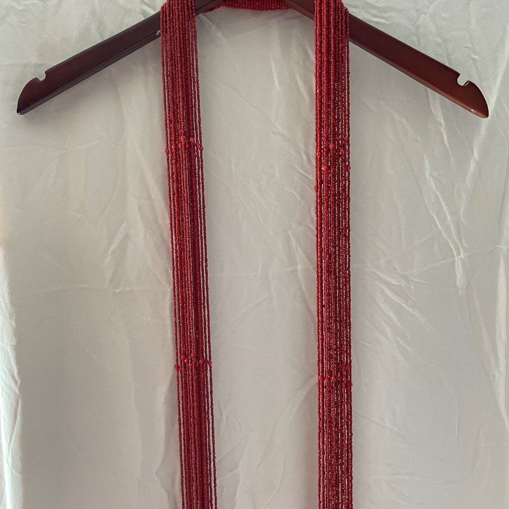 Long coral colored beaded necklace/scarf